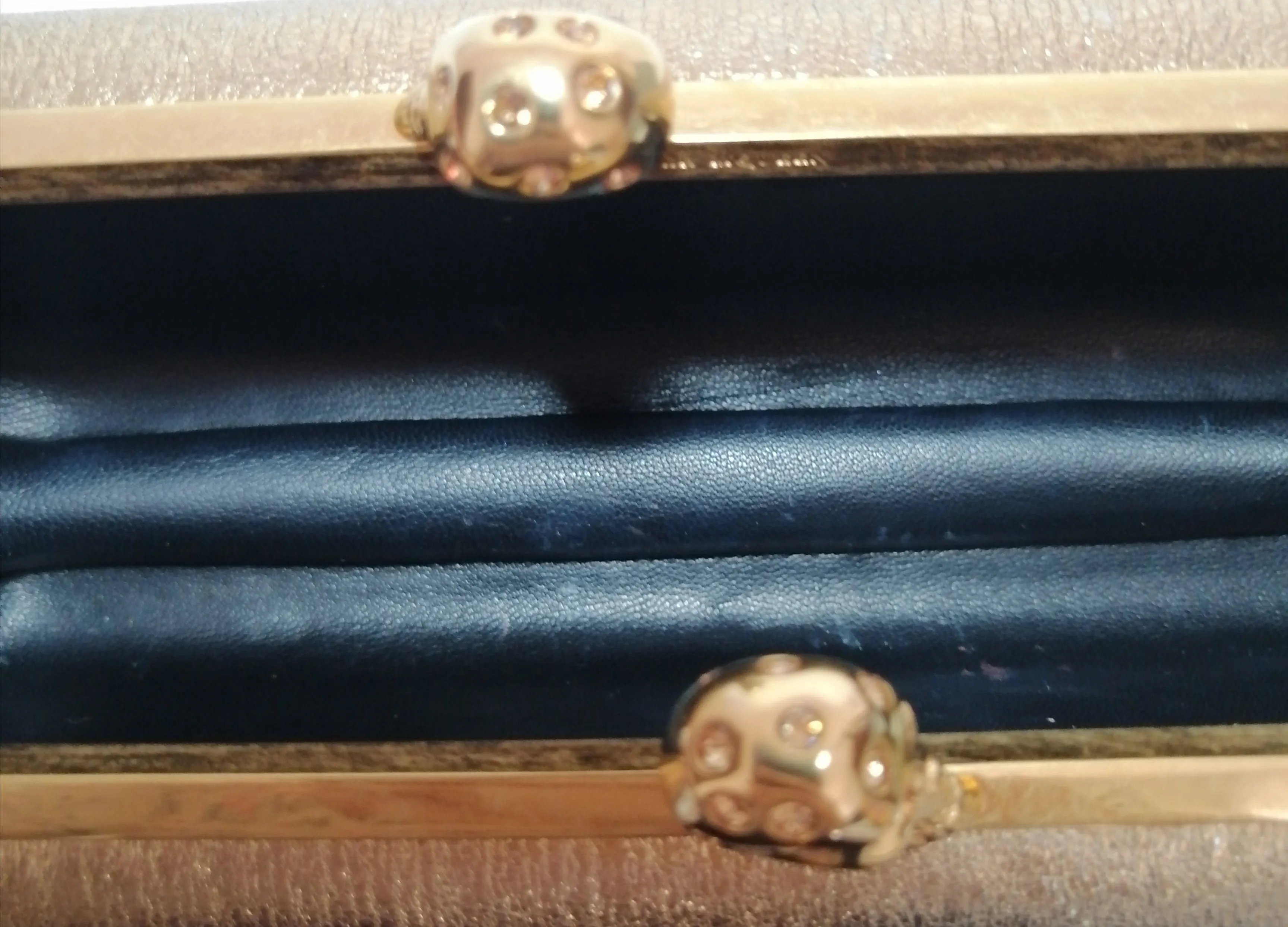 Alexander McQueen Gold Foil Leather Twin Skull Clutch | Pre Loved |