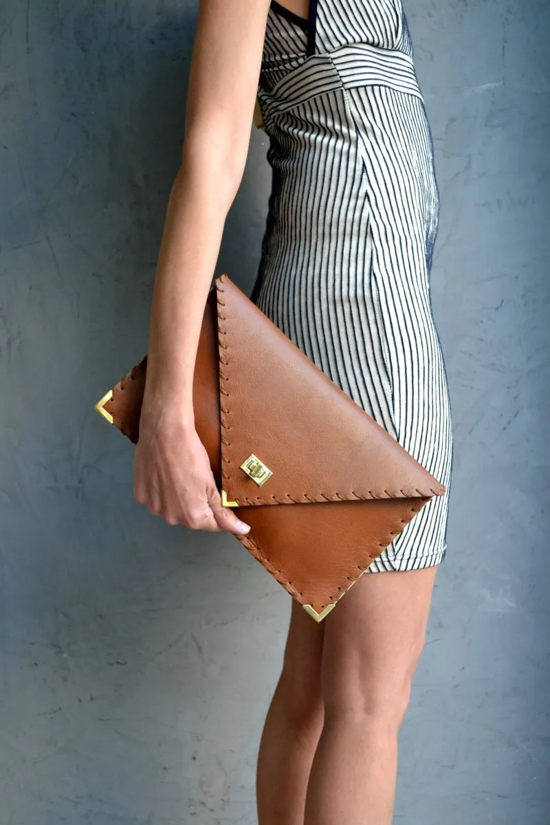 Symmetria leather clutch in tabac brown: Gold / Small